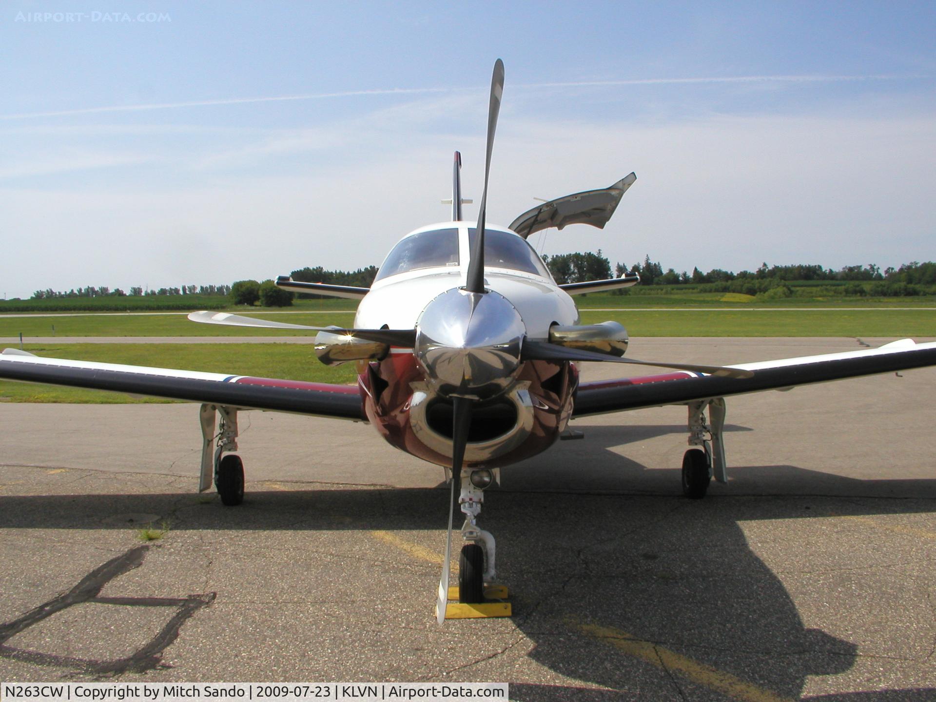 N263CW, 2003 Socata TBM-700 C/N 263, Parked on the ramp at Airlake.