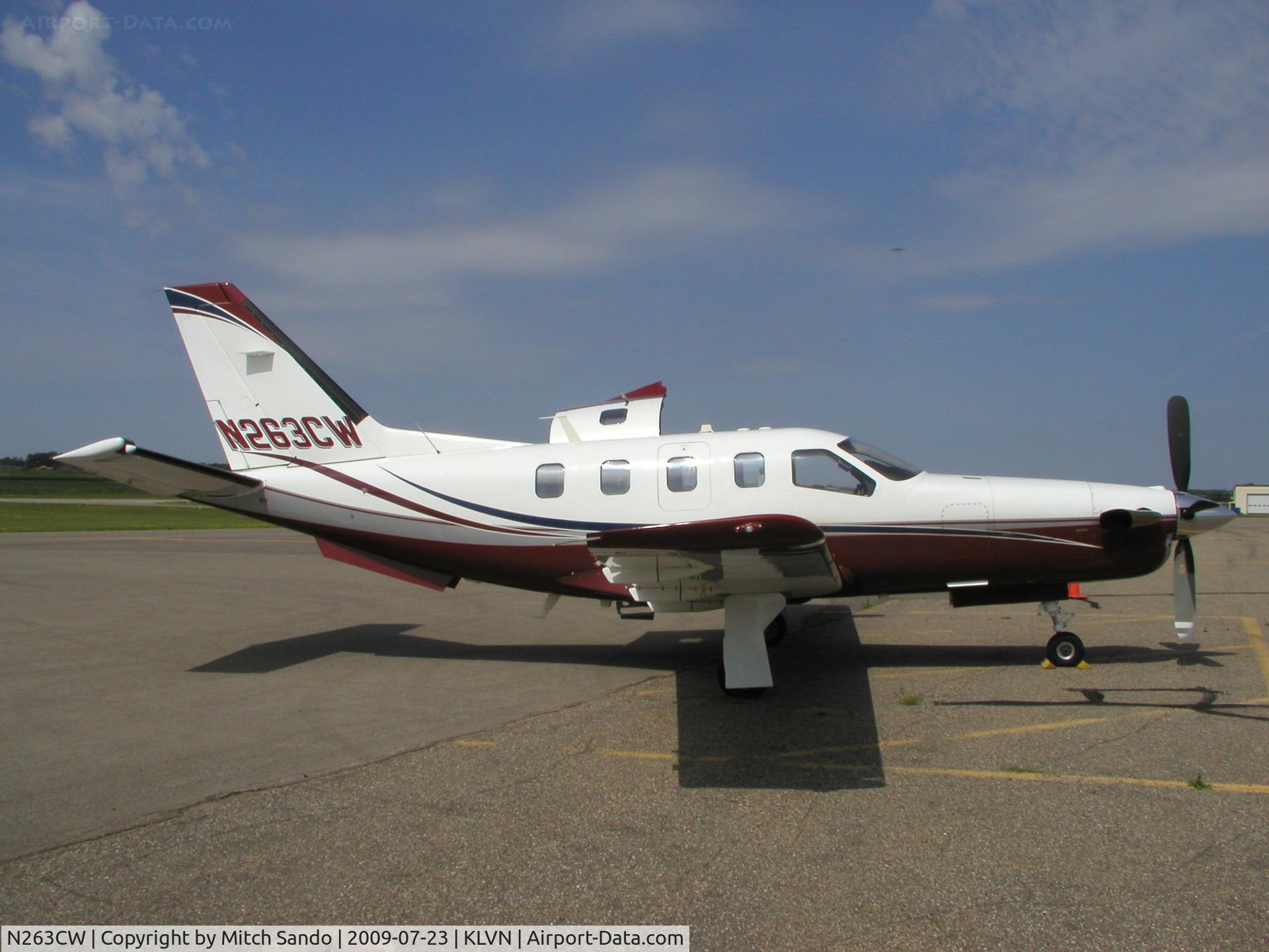 N263CW, 2003 Socata TBM-700 C/N 263, Parked on the ramp at Airlake.
