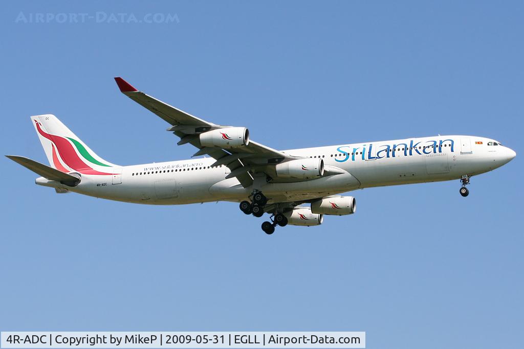 4R-ADC, Airbus A340-311 C/N 034, Short final to 09L at Heathrow.