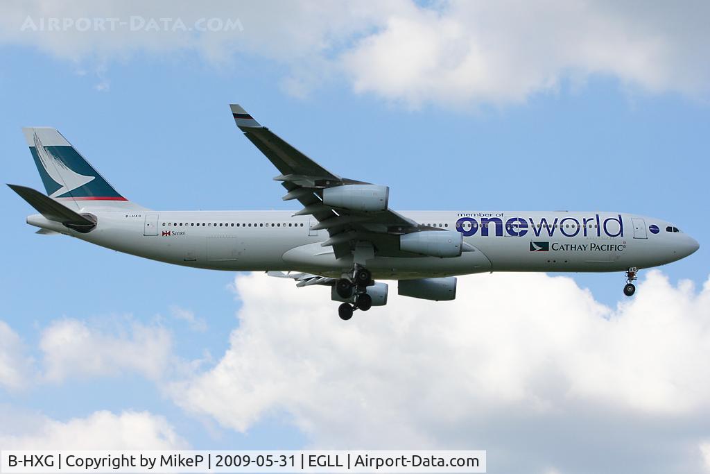 B-HXG, 1998 Airbus A340-313 C/N 208, Short final to 09L at Heathrow.