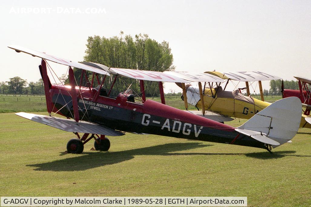 G-ADGV, 1935 De Havilland DH-82A Tiger Moth II C/N 3340, De Havilland DH-82A Tiger Moth II. Behind is DH82A G-ANFM. At Old Warden's De Havilland Day in 1989.