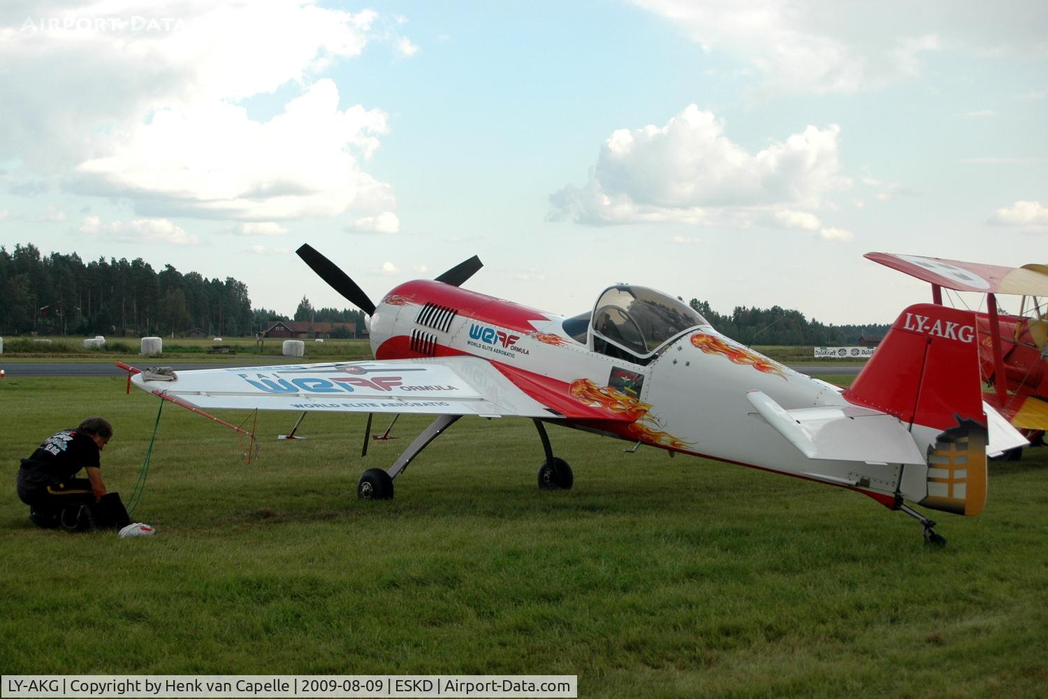 LY-AKG, Sukhoi SU-26M C/N 06-03, Famous aerobatics pilot Jurgis Kairys ties his plane to the ground for the night at Dala-Järna airfield, Sweden