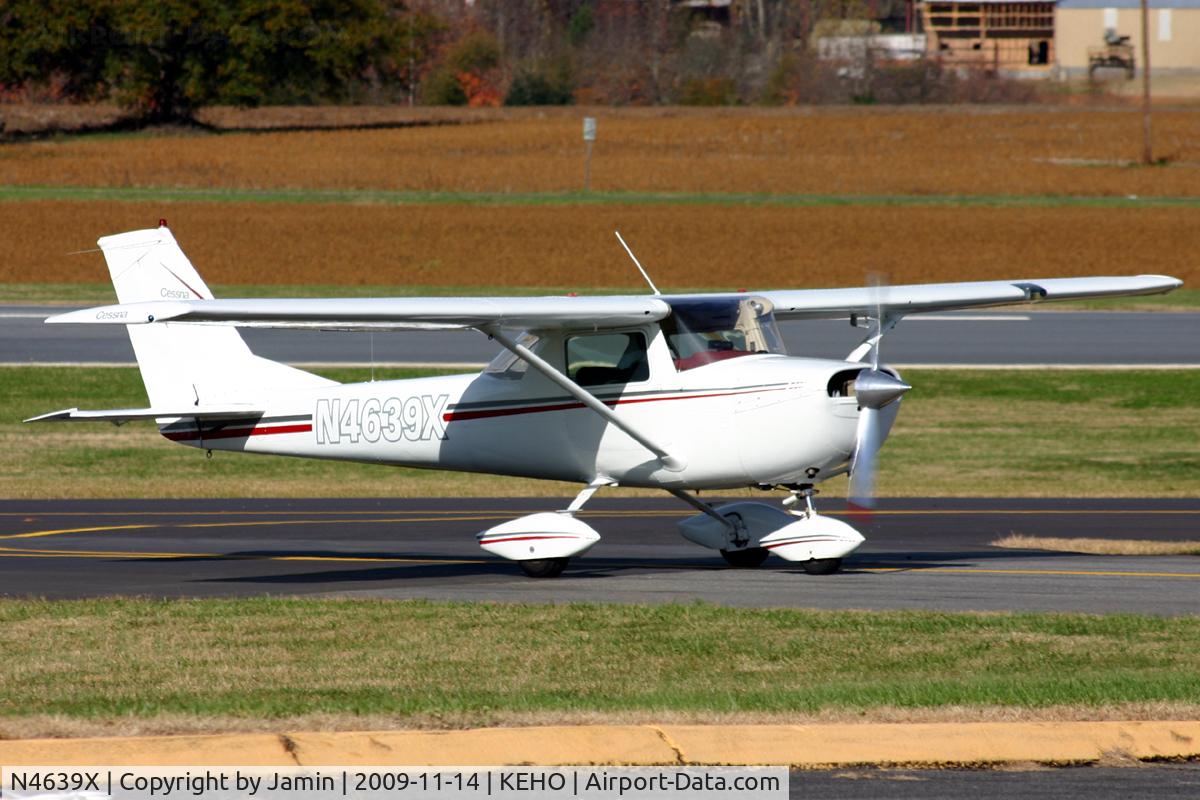 N4639X, 1966 Cessna 150G C/N 15064689, Taxiing up the hill to the ramp during a fly-in.