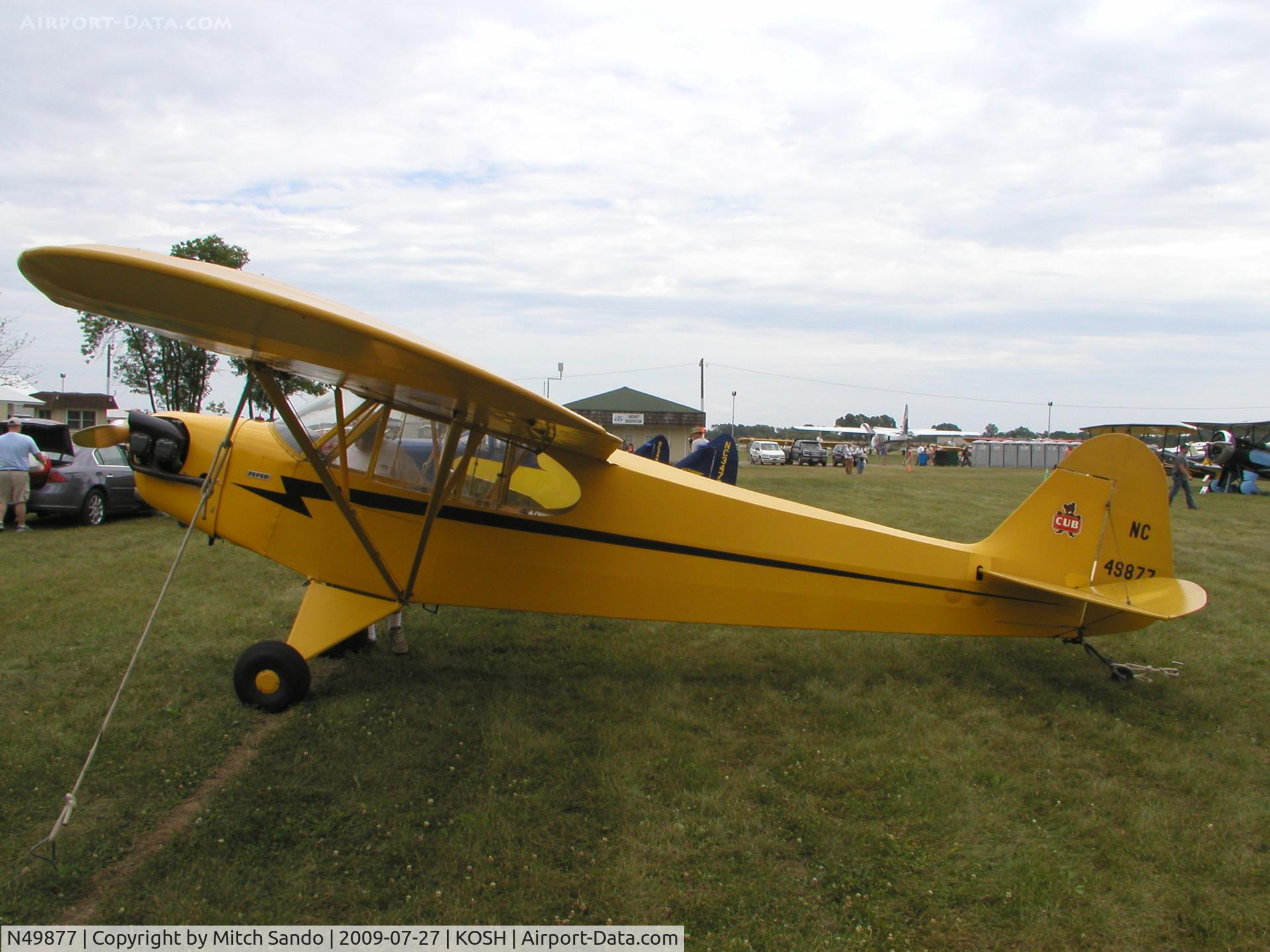 N49877, 1942 Piper J3C-65 Cub Cub C/N 10010, EAA AirVenture 2009.