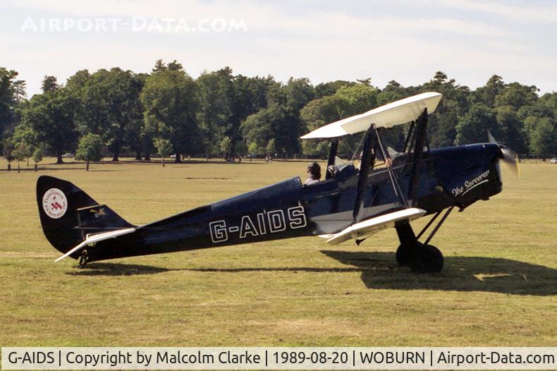 G-AIDS, 1941 De Havilland DH-82A Tiger Moth II C/N 84546, De Havilland DH-82A Tiger Moth II. Seen at the Famous Grouse DH Moth Rally 1989 held in the grounds of Woburn Abbey.