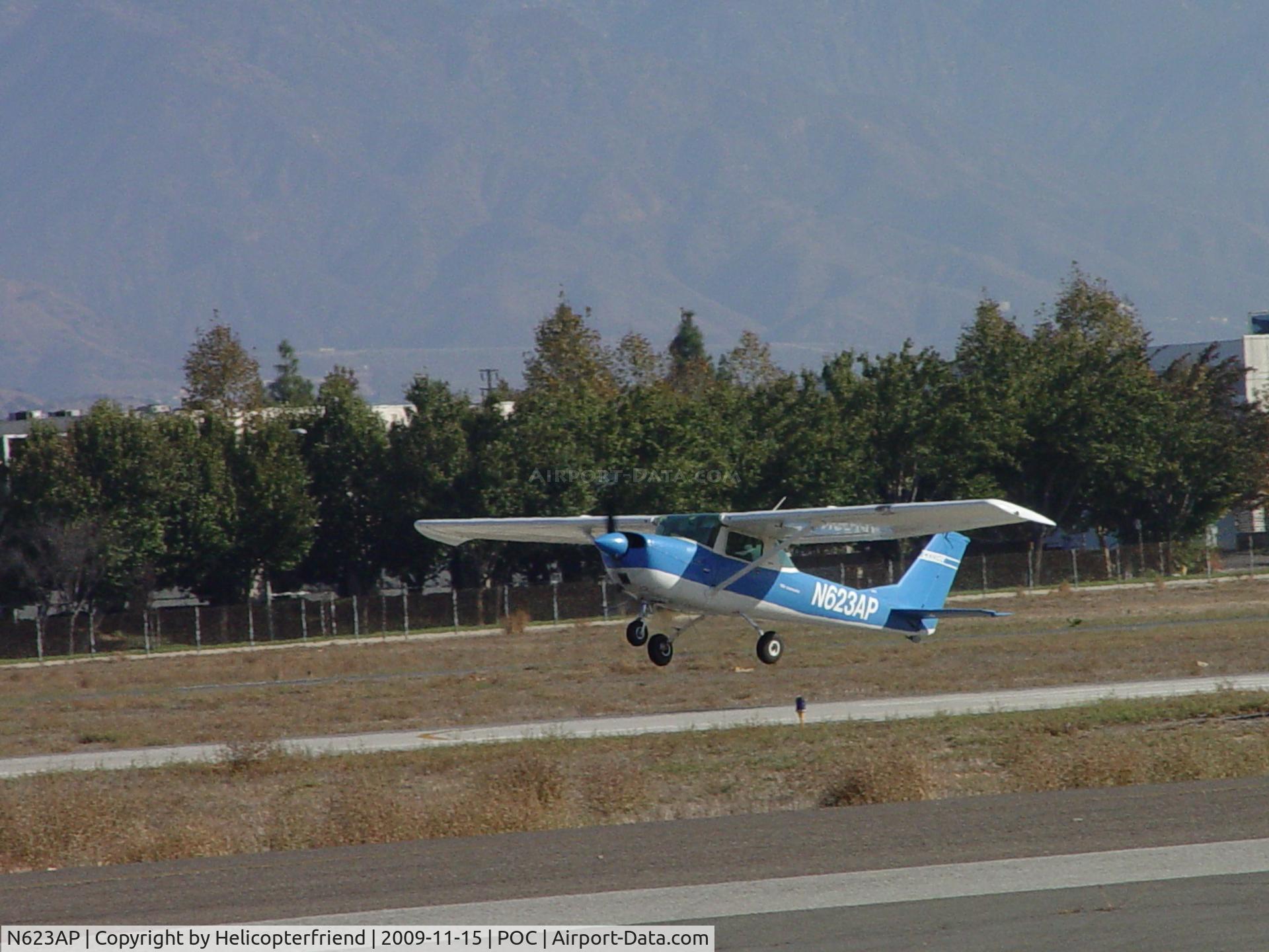 N623AP, 1969 Cessna 150J C/N 15070915, Touched and now is climbing from 26L