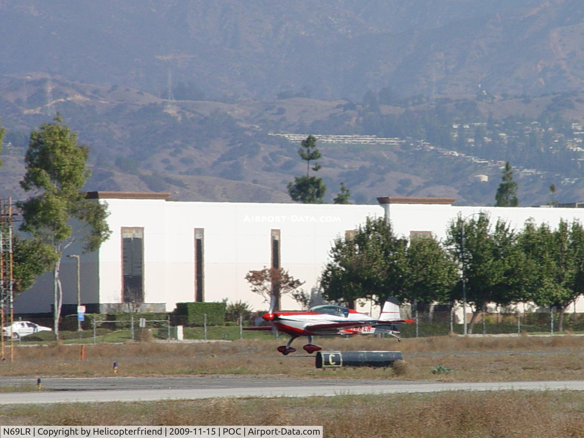 N69LR, 2005 Extra EA-300/L C/N 1197, Starting to roll for take off 26R