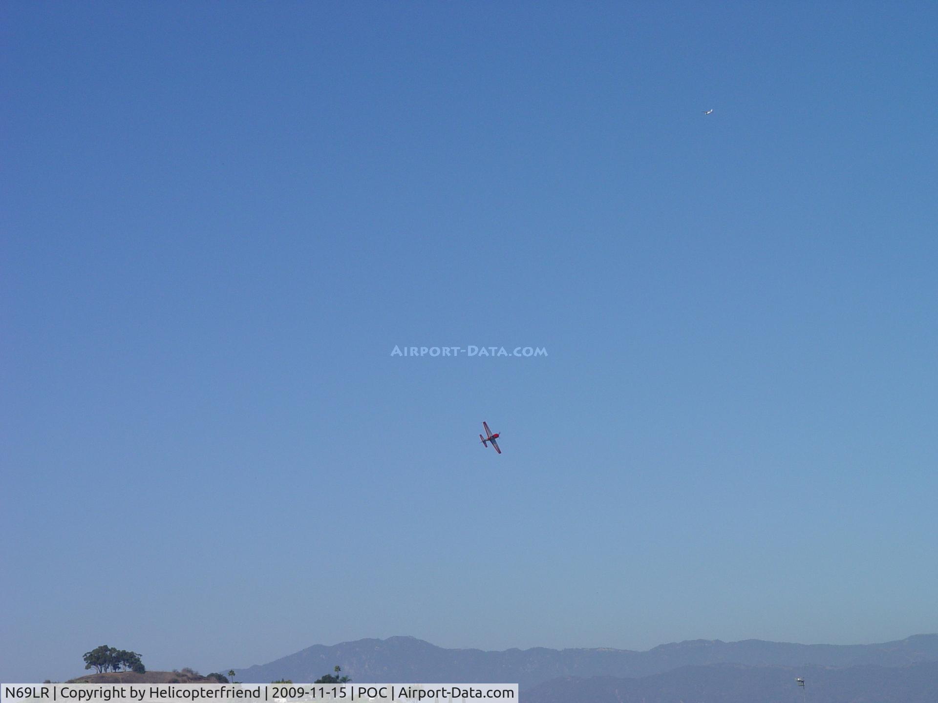 N69LR, 2005 Extra EA-300/L C/N 1197, High speed climb out to the right after take off