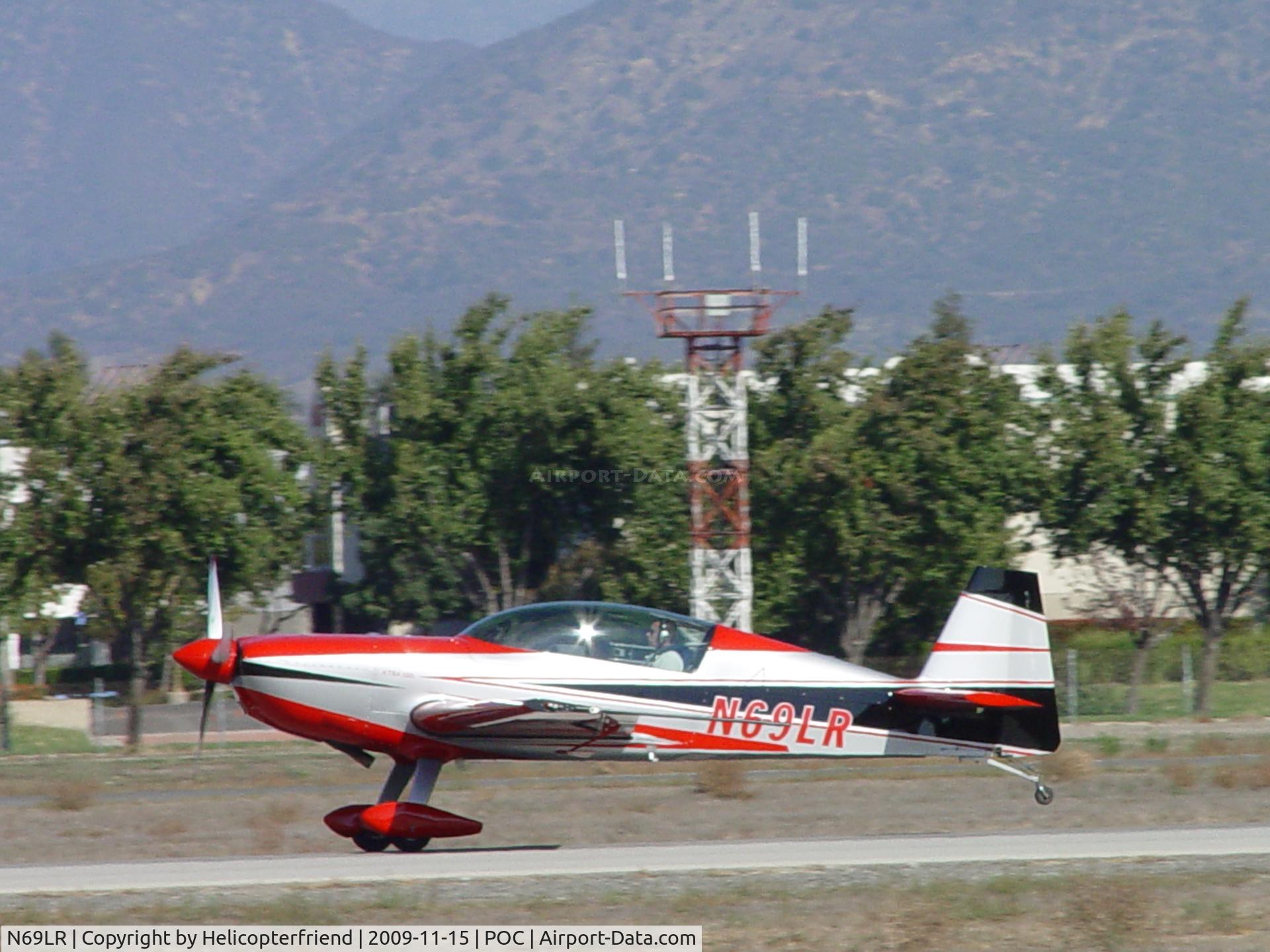 N69LR, 2005 Extra EA-300/L C/N 1197, Keeping the tail up westbound on 26L