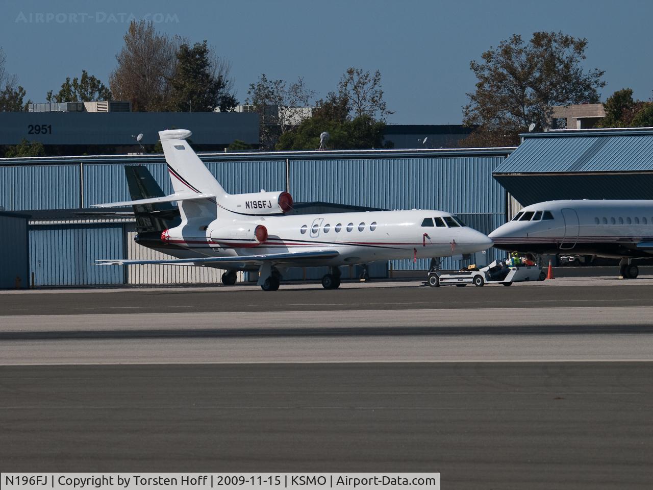 N196FJ, 1989 Dassault Falcon 50 C/N 196, N196FJ getting repositioned on the ramp