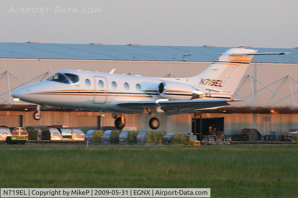 N719EL, Raytheon Hawker 400XP C/N RK-488, About to touchdown on Runway 09.