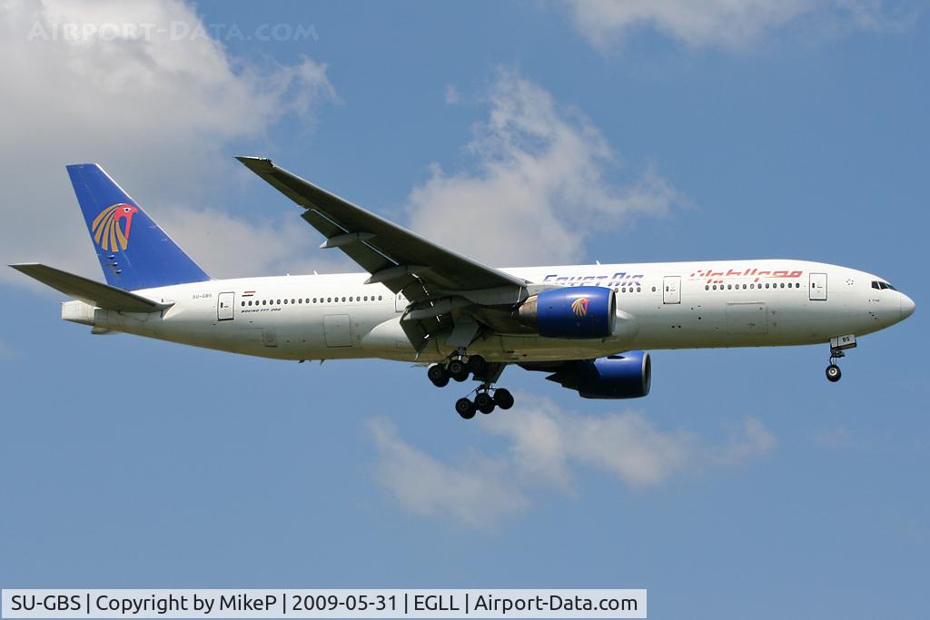 SU-GBS, 1997 Boeing 777-266/ER C/N 28425, Short final for Runway 09L at Heathrow.