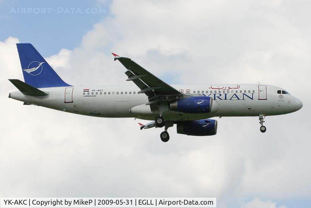 YK-AKC, 1999 Airbus A320-232 C/N 1032, Short final for Runway 09L at Heathrow.