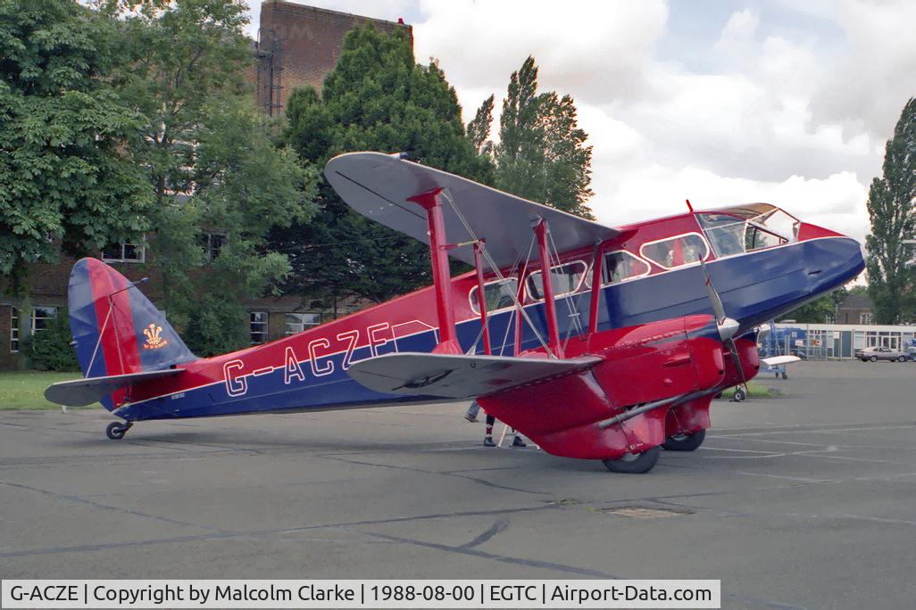 G-ACZE, 1934 De Havilland DH-89A Dragon Rapide C/N 6264, De Havilland DH-89A Dragon Rapide at Cranfield en-route to the Tiger Moth Rally at Woburn Abbey in 1988.