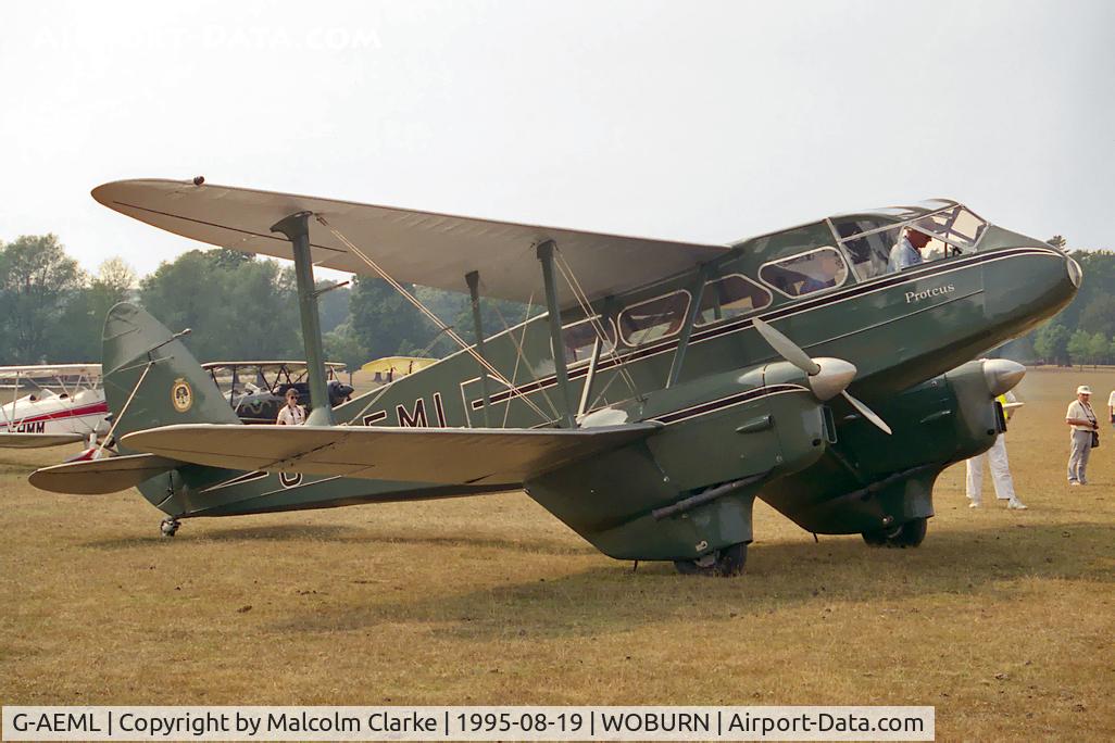 G-AEML, 1936 De Havilland DH-89A Dragon Rapide C/N 6337, De Havilland DH-89A Dragon Rapide. At the 1995 De Havilland Moth Rally held in the grounds of Woburn Abbey.