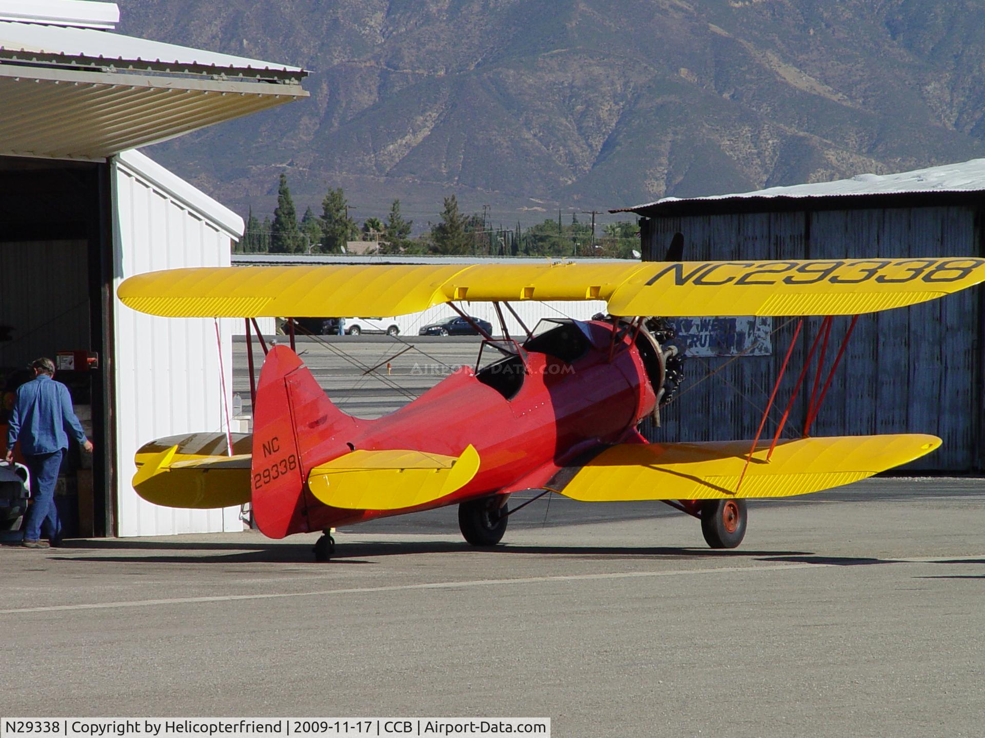 N29338, 1940 Waco UPF-7 C/N 5365, Waiting for hanger cleanup