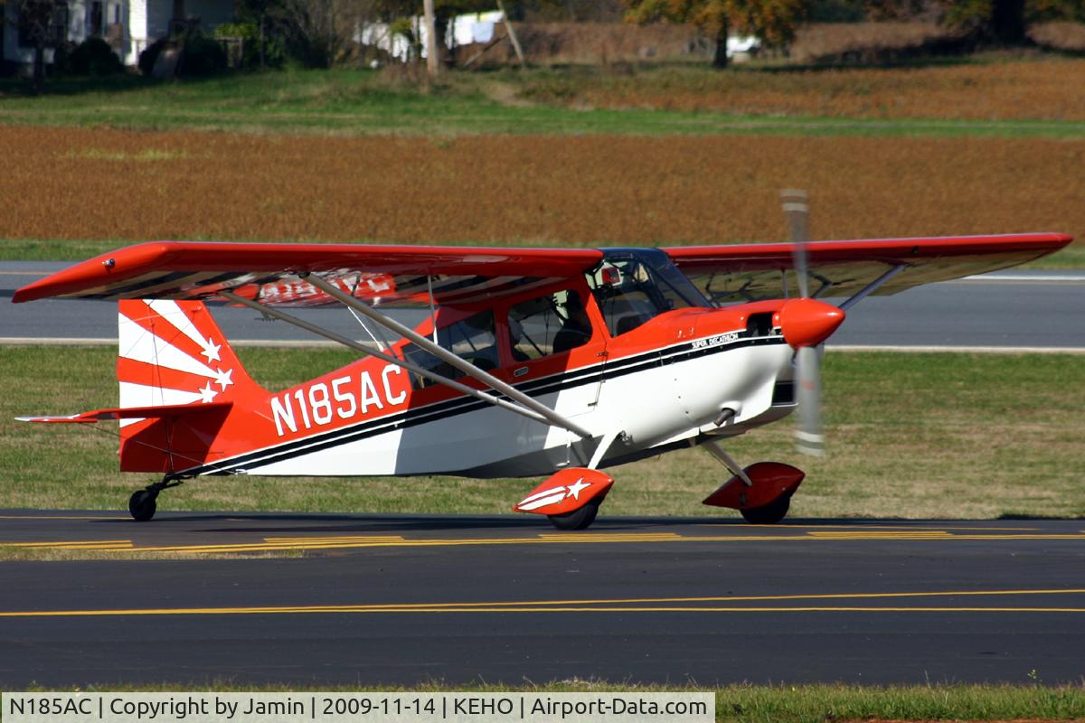 N185AC, 1993 American Champion 8KCAB Super Decathlon C/N 723-93, Taxiing up the hill to the ramp during a fly-in.