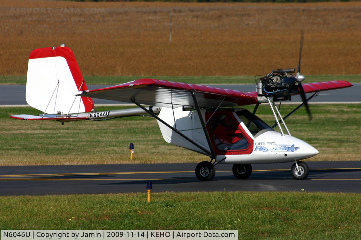 N6046U, 2002 Flightstar IISL C/N 52957, Taxiing up the hill to the ramp during a fly-in.