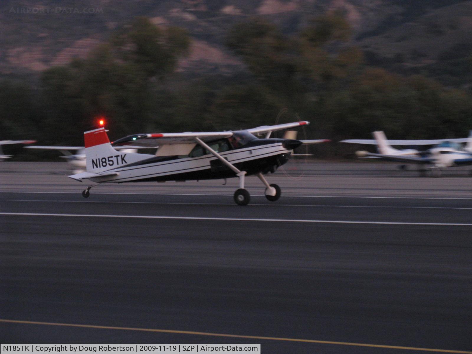 N185TK, 1981 Cessna A185F Skywagon 185 C/N 18504366, 1981 Cessna A185F SKYWAGON II, Continental IO-520-D 300 Hp, landing roll Rwy 22 at dusk
