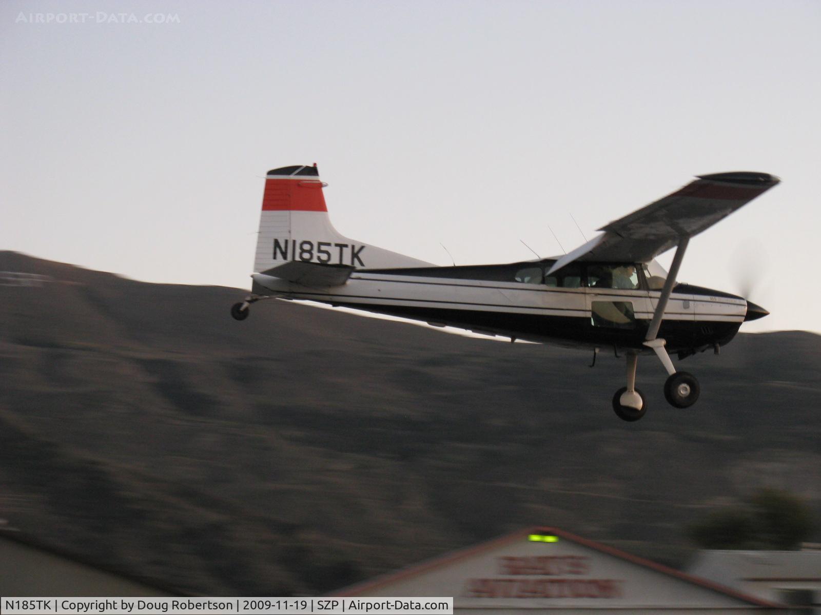 N185TK, 1981 Cessna A185F Skywagon 185 C/N 18504366, 1981 Cessna A185F SKYWAGON II, Continental IO-520-D 300 Hp, landing Rwy 22 at dusk