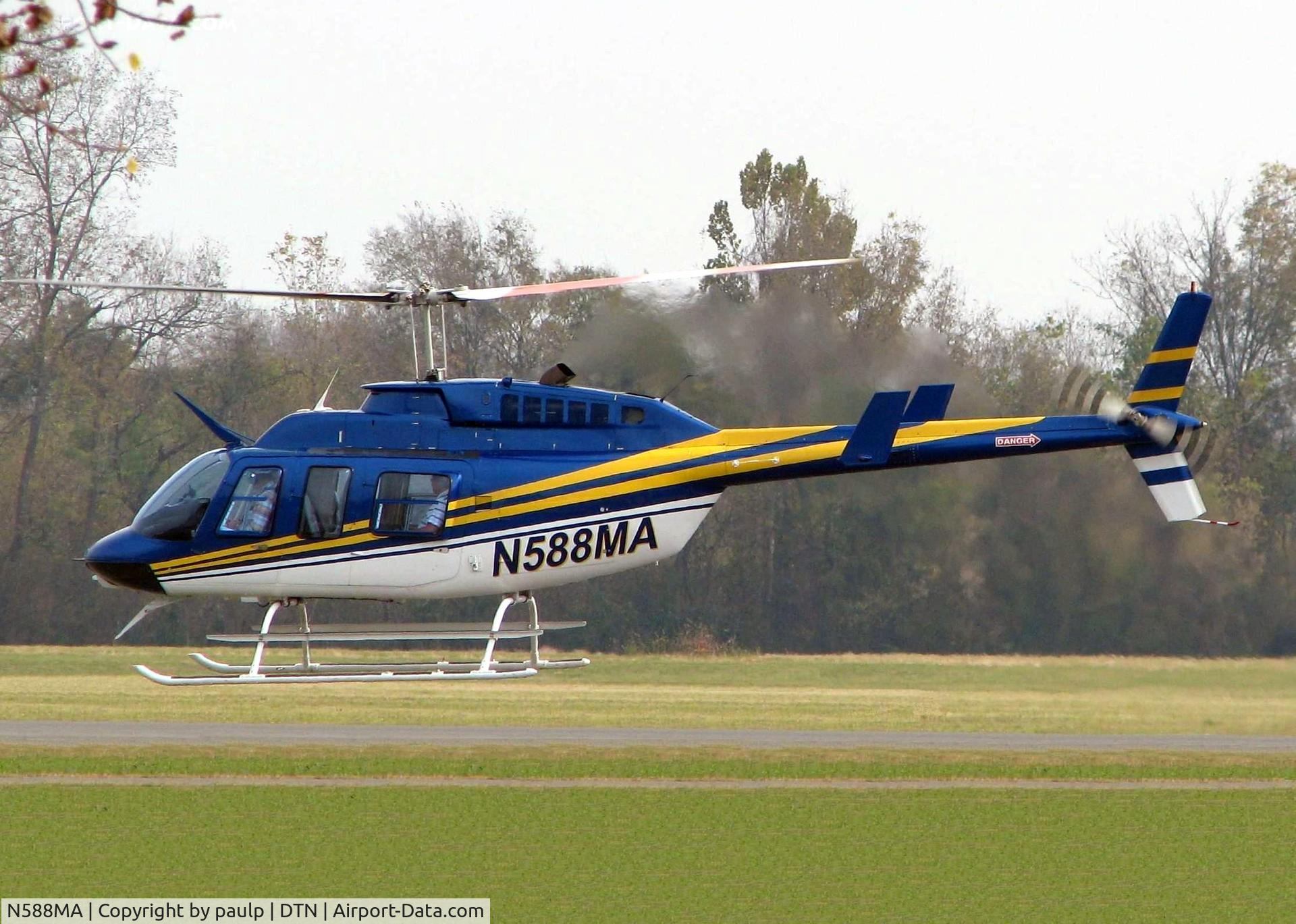 N588MA, Bell 206L-3 LongRanger III C/N 51350, Departing the Shreveport Downtown Airport.