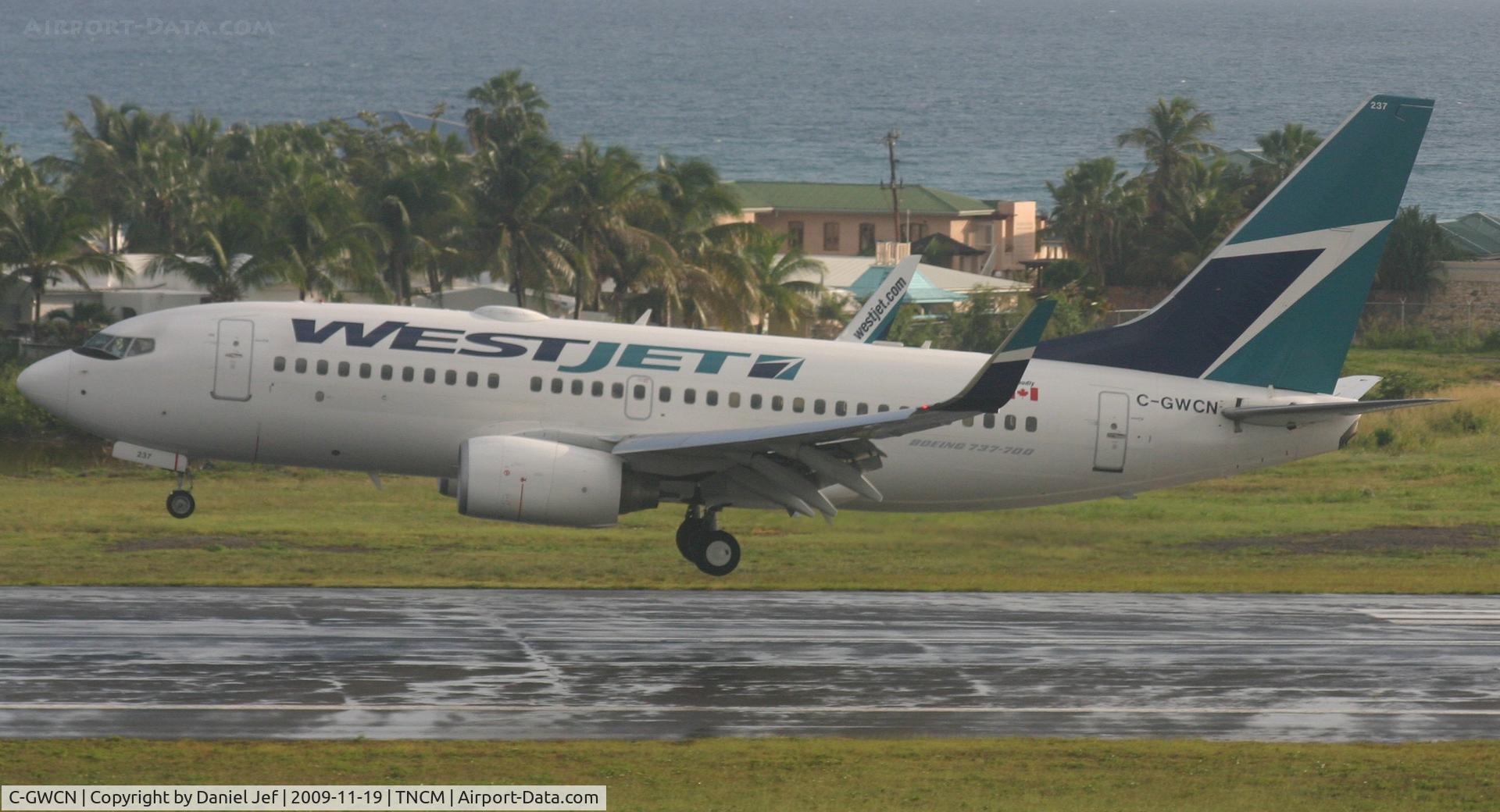 C-GWCN, 2005 Boeing 737-7CT C/N 34157, West jet landing at St Maarten