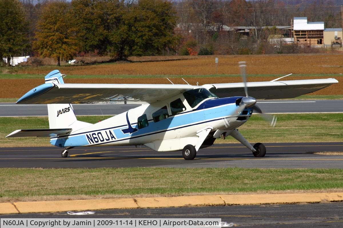 N60JA, 1967 Helio H-295/U10D C/N c/n 1240 (66-14338), Taxiing up the hill to the ramp during a fly-in.
