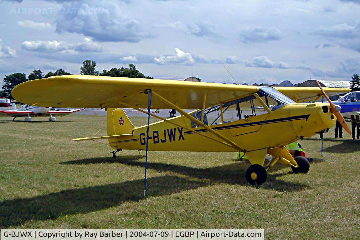 G-BJWX, 1952 Piper L-18C Super Cub C/N 18-1985, Piper L-18C-95 Super Cub [18-1985] Kemble~G 09/07/2004. Seen at the PFA Fly in 2004 Kemble UK.