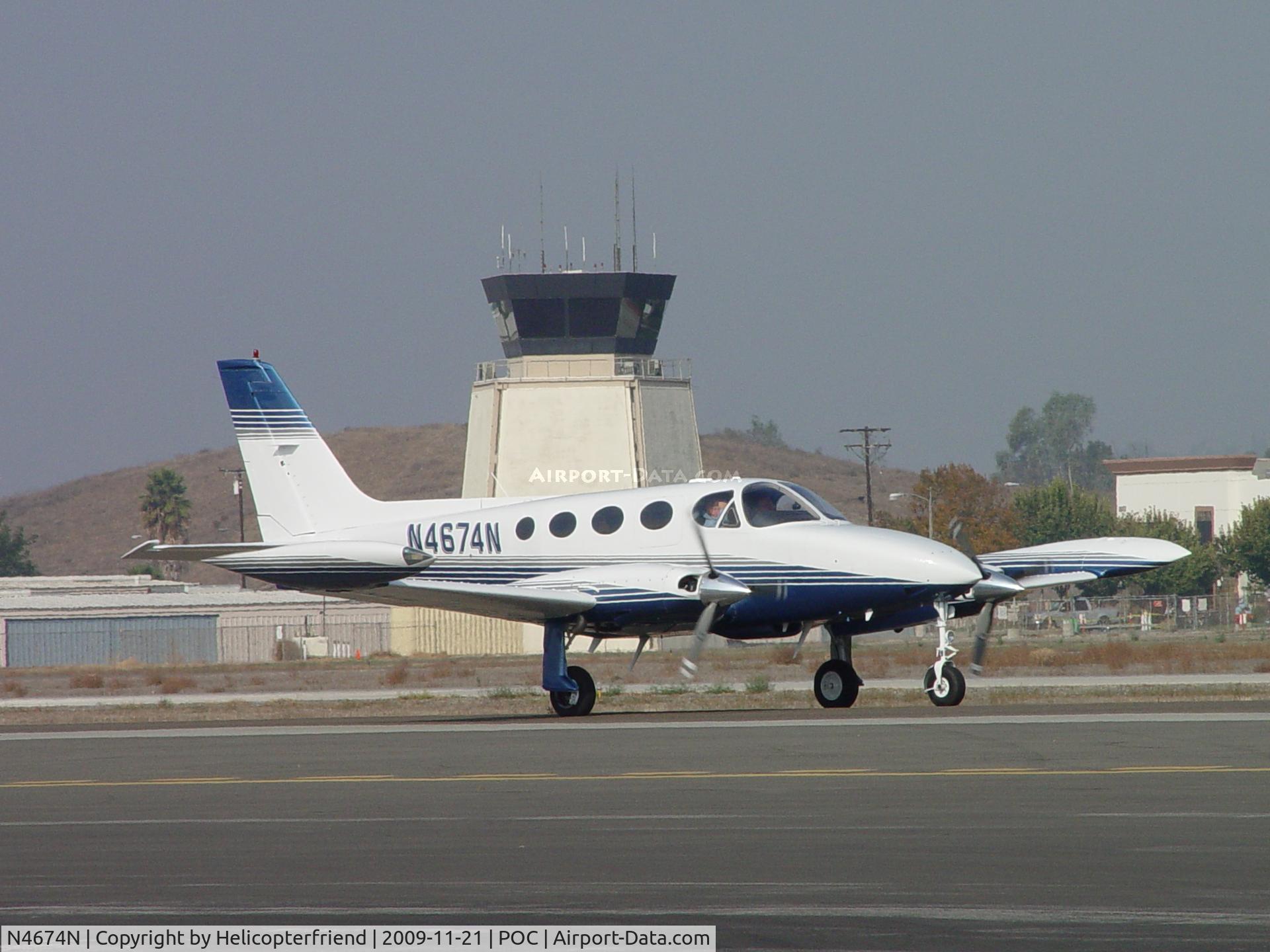 N4674N, 1980 Cessna 340A C/N 340A1023, Taxiing to 26L with Brackett Tower in the background