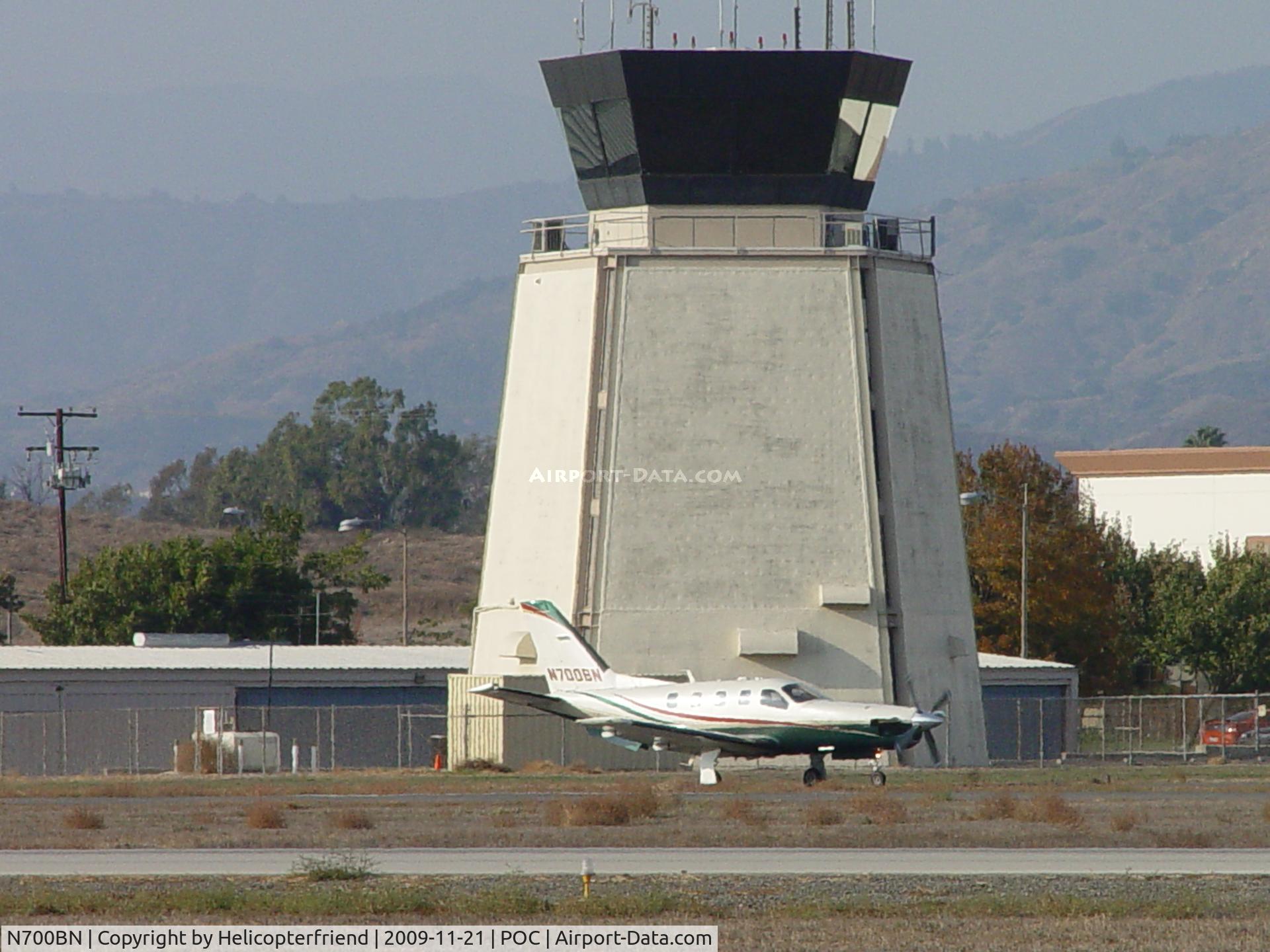 N700BN, 2001 Socata TBM-700 C/N 203, Taxiing past Brackett Tower enroute 26R