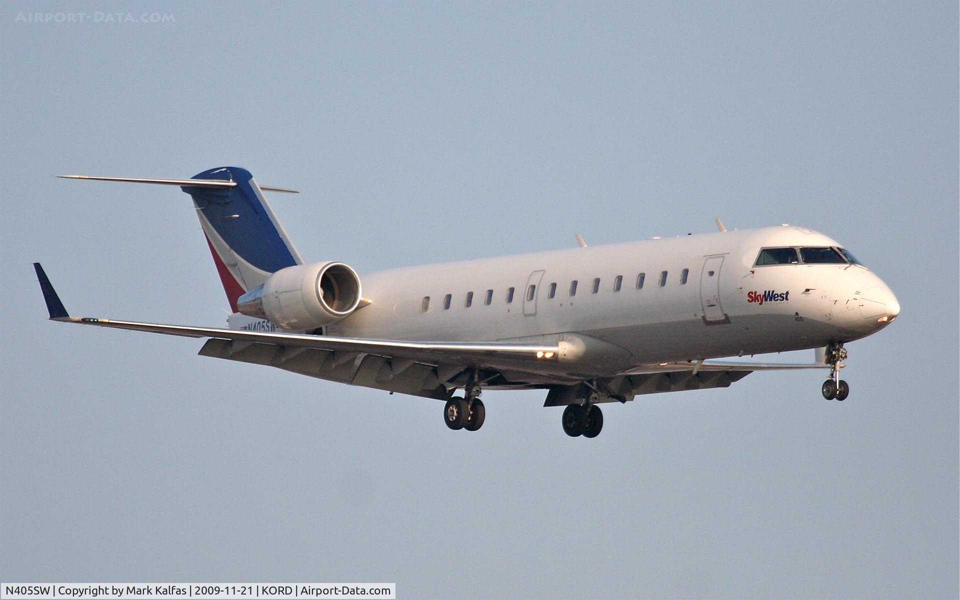 N405SW, 1993 Canadair CRJ-200LR (CL-600-2B19) C/N 7029, SkyWest CL-600-2B19, SKW5788 arriving from KSBN, short final 22R KORD.