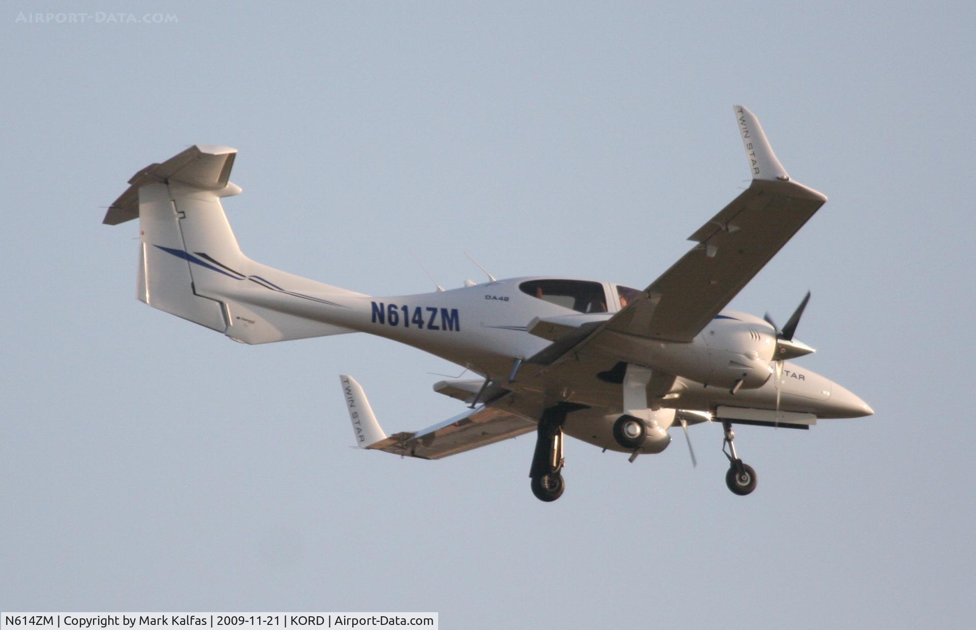 N614ZM, 2007 Diamond DA-42 Twin Star C/N 42.AC113, TWIN EAGLES AVIATION LLC., Diamond Aircraft Ind Inc DA 42 arriving from KLUK, short final 22R KORD.