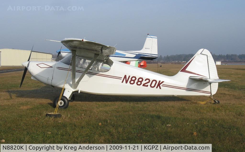 N8820K, 1947 Stinson 108-1 Voyager C/N 108-1820, 1947 Stinson 108-1 on the grass ramp at Grand Rapids, MN.