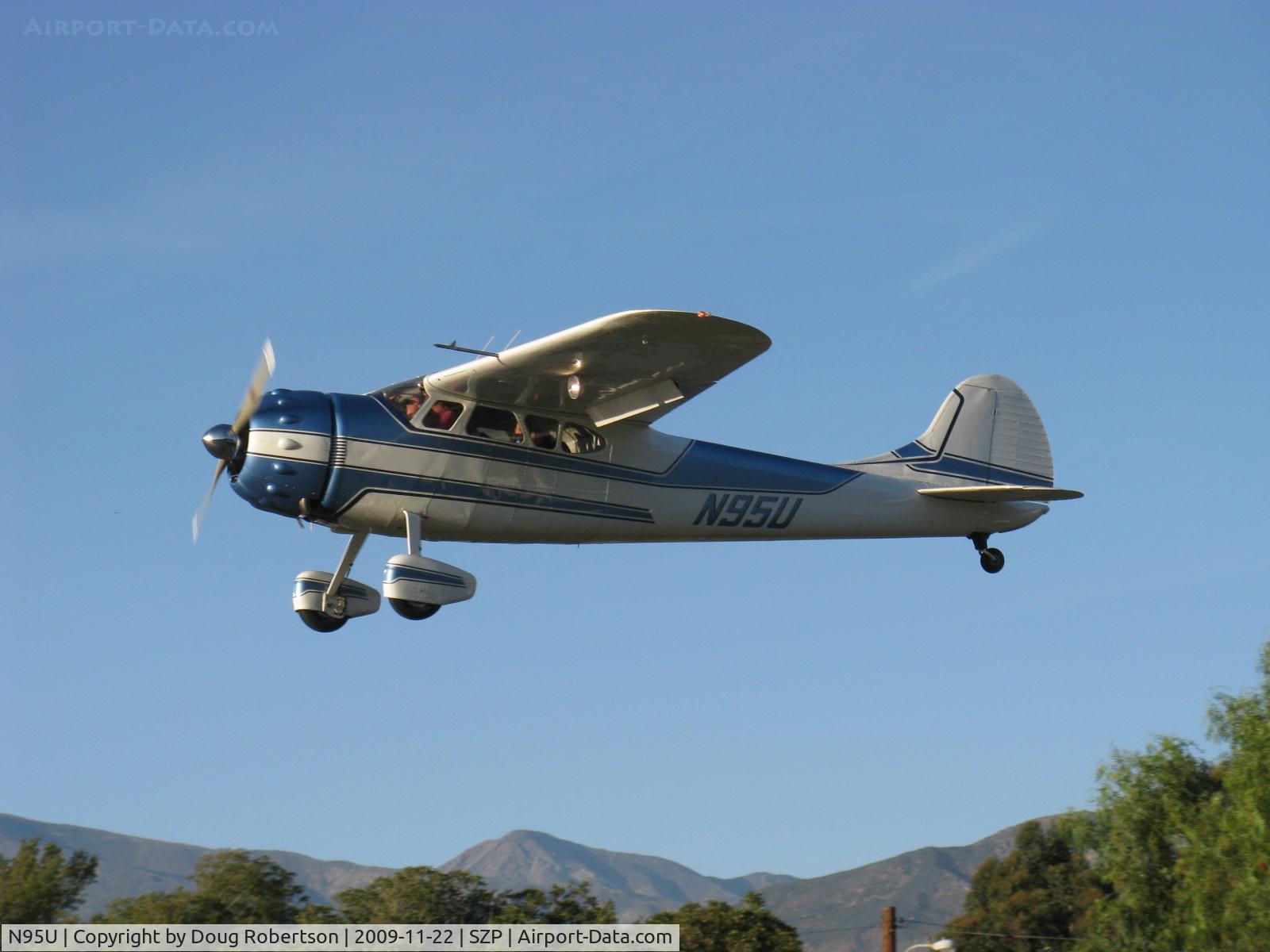 N95U, 1951 Cessna 195A C/N 7714, 1951 Cessna 195A BUSINESSLINER, Jacobs R755A-2  275 Hp, on final Rwy 22. The Cessna 190/195 models were their last radial-powered aircraft. 6,704' Hines Peak in background.