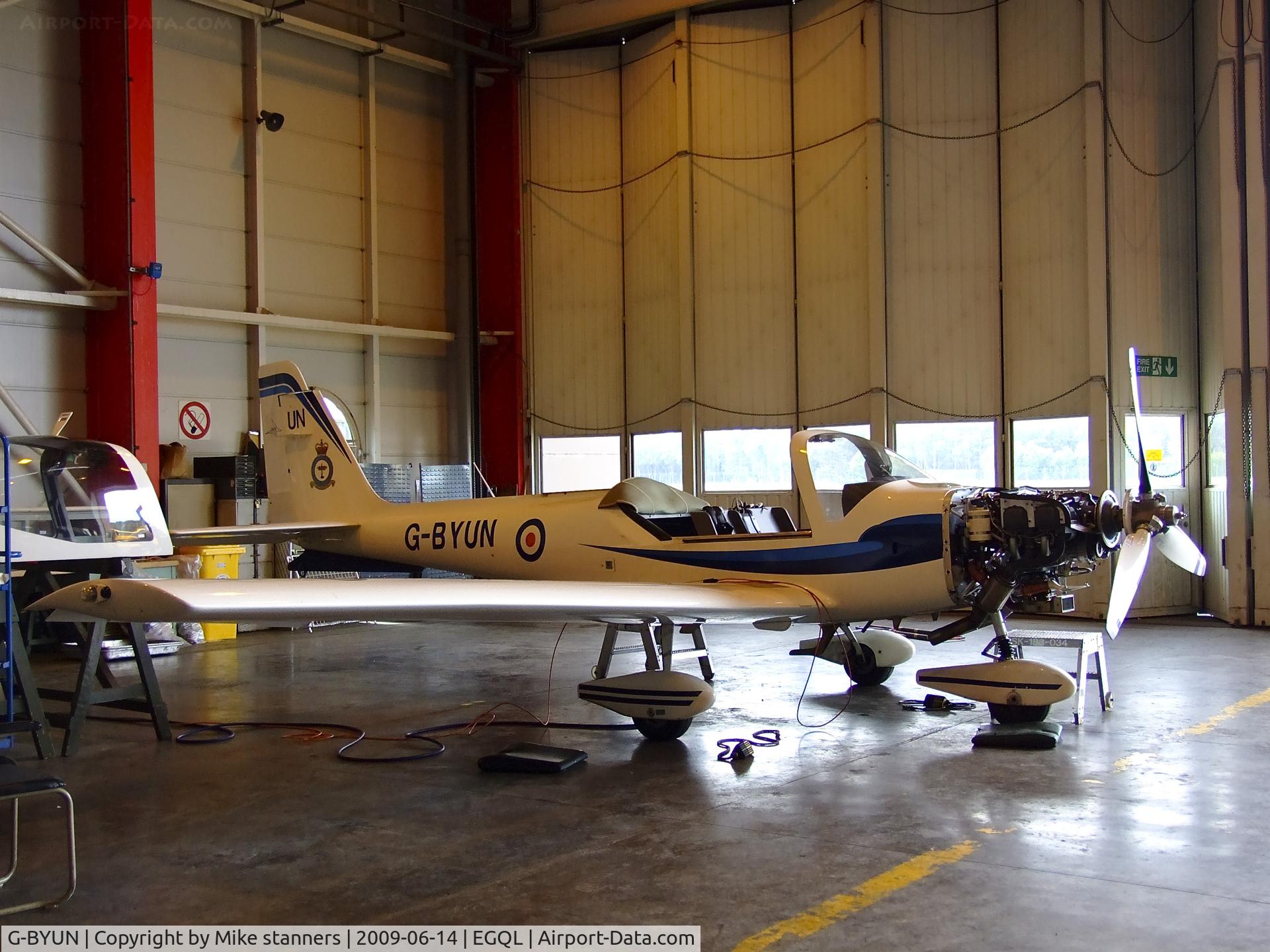 G-BYUN, 1999 Grob G-115E Tutor T1 C/N 82099/E, 12AEF Tutor in the hanger at Leuchars