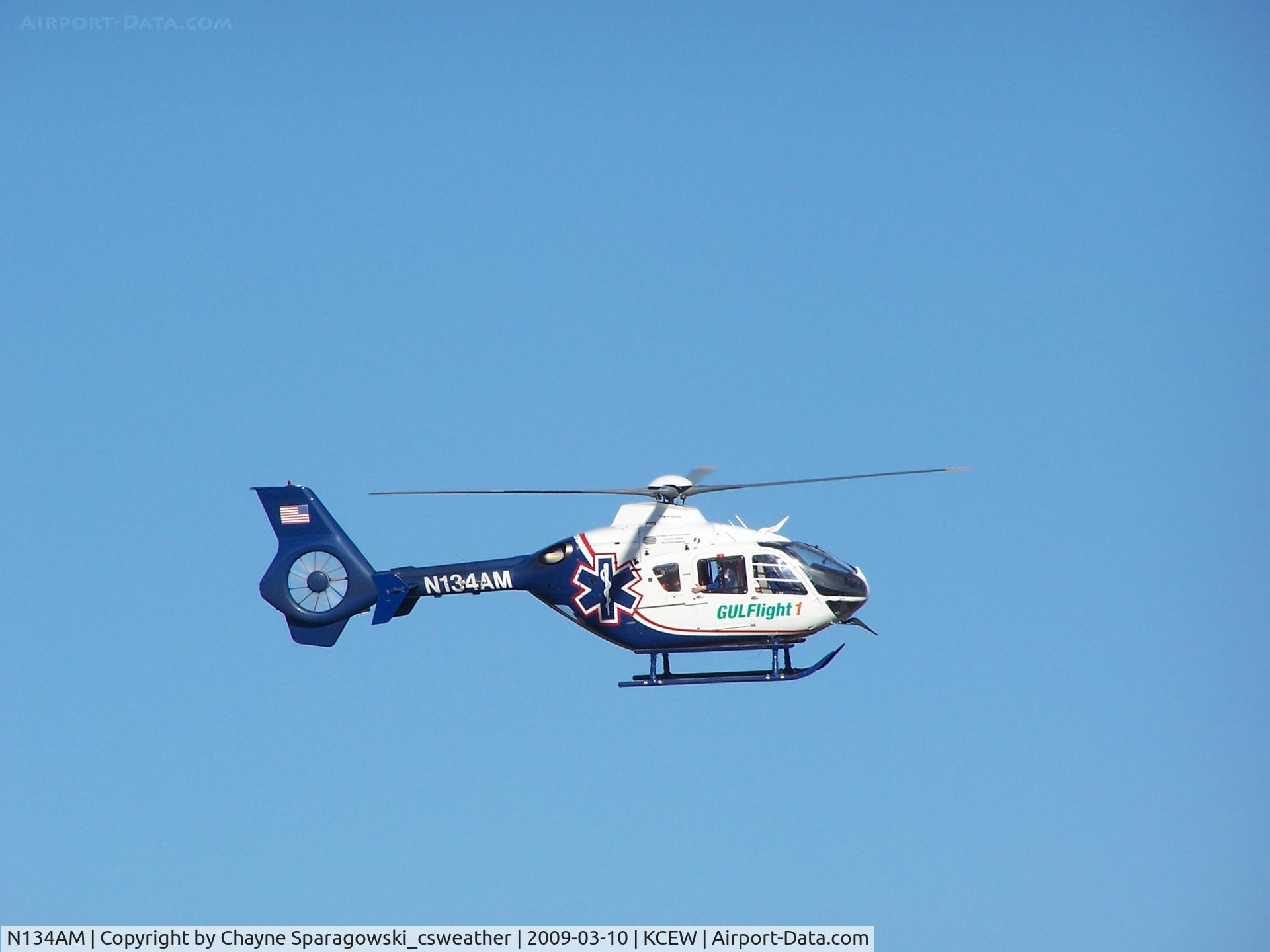 N134AM, 2004 Eurocopter EC-135P-2 C/N 0324, GulFlight1 circles the airport