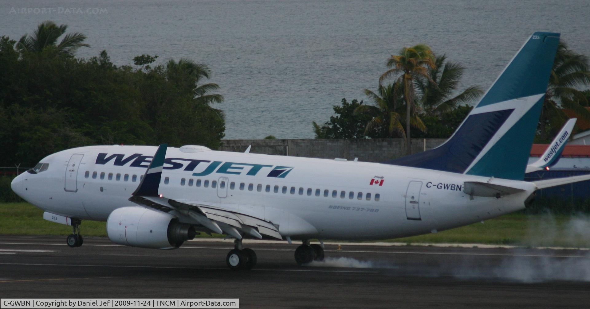 C-GWBN, 2005 Boeing 737-7CT C/N 34155, touch down at tncm