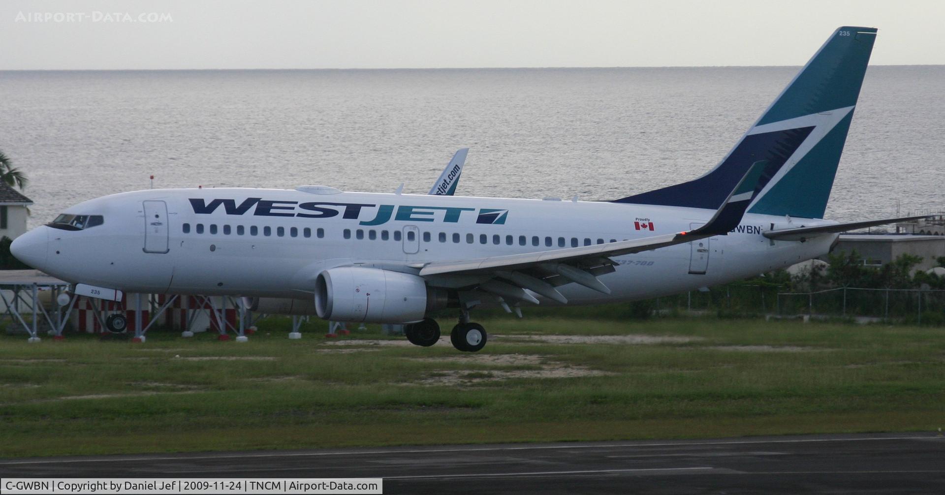 C-GWBN, 2005 Boeing 737-7CT C/N 34155, West jet in the glide slope at tncm
