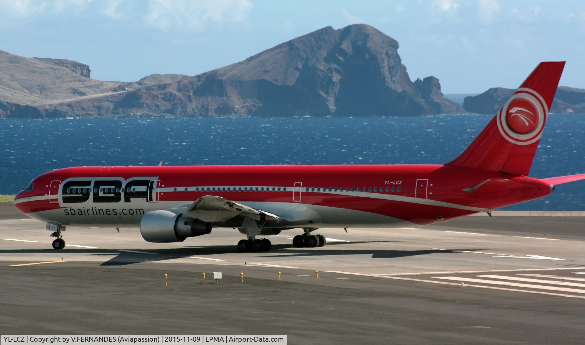 YL-LCZ, 1991 Boeing 767-3Y0/ER C/N 25000, nice colors and fantastic background