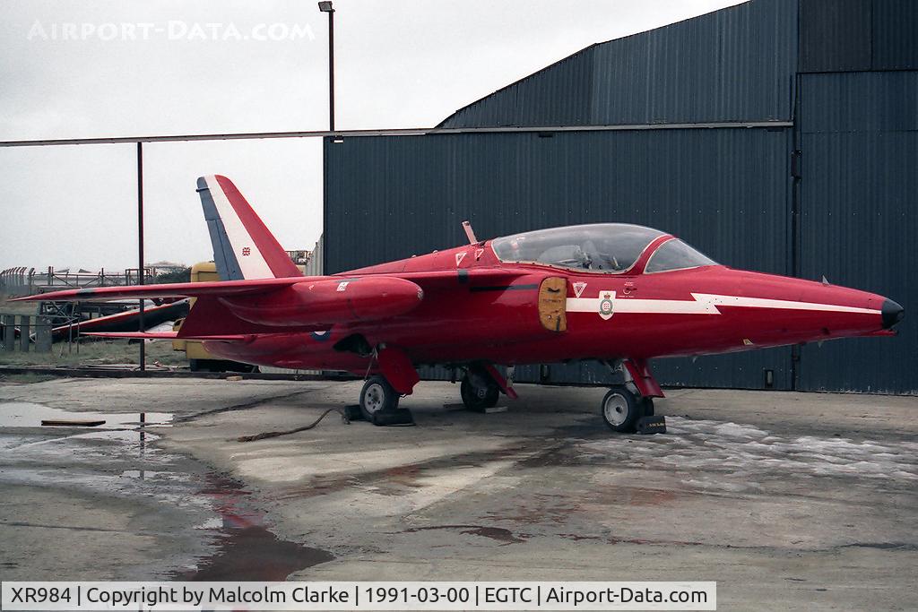 XR984, 1966 Hawker Siddeley Gnat T.1 C/N FL581,  Hawker Siddeley Gnat T1. Previously with RAF 4 FTS and No 1 SoTT. Seen here in 1991 at the VAT facility at Cranfield prior to shipment to the USA. Now at the San Diego Flight Museum (N316RF).