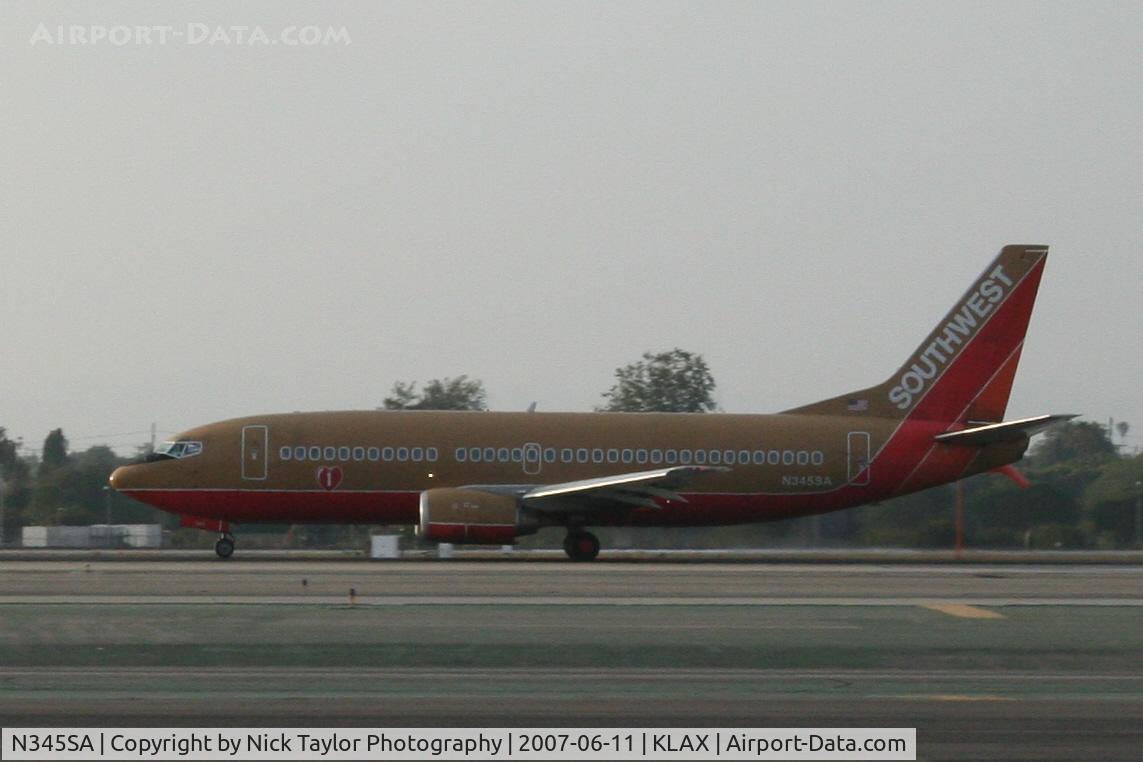 N345SA, 1987 Boeing 737-3K2 C/N 23786, Landing 24R