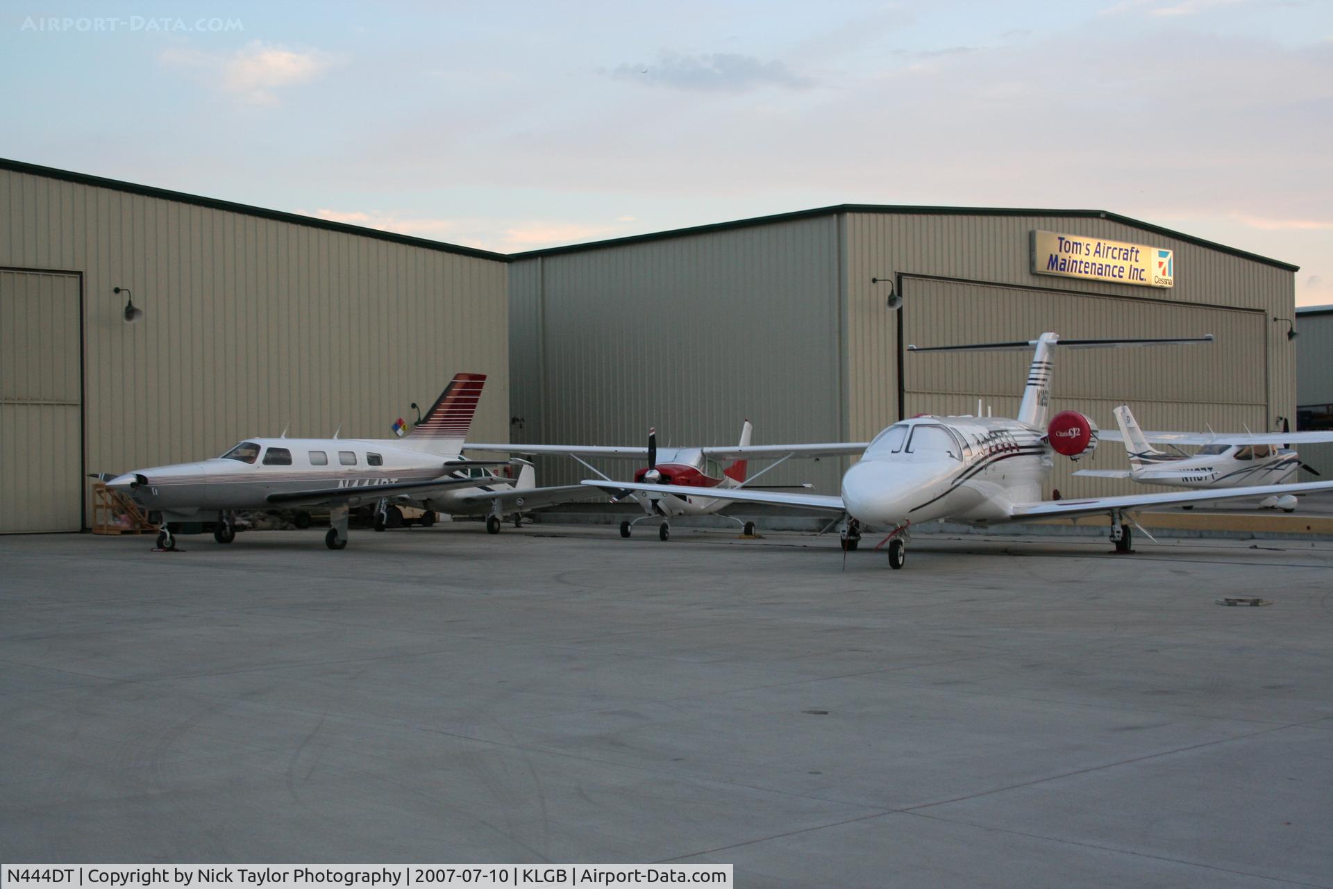 N444DT, 1986 Piper PA-46-310P Malibu C/N 4608008, Sitting with N490SC at Aeroexec