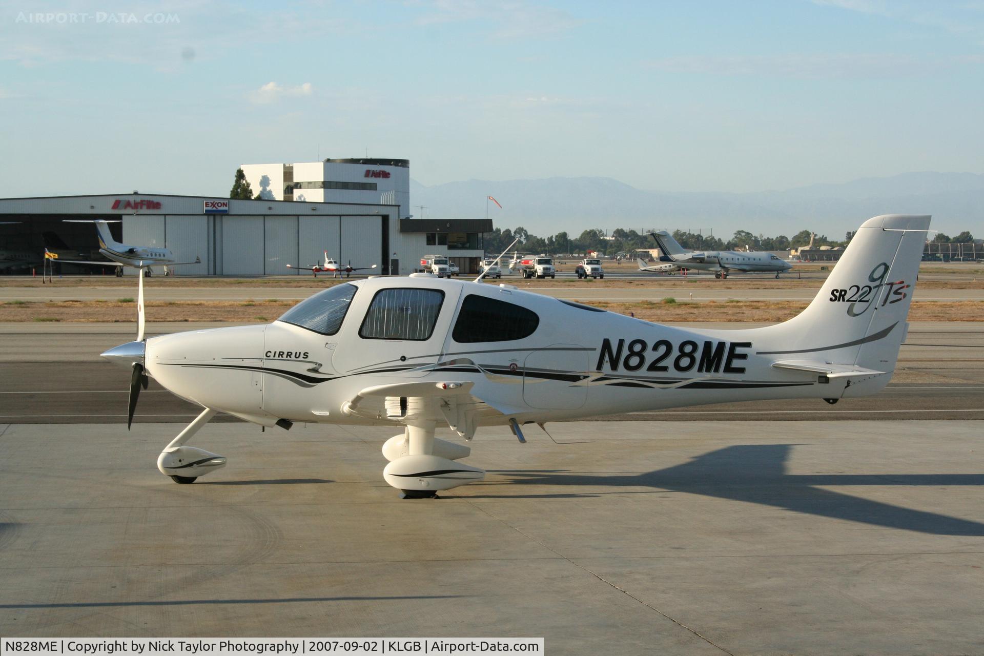N828ME, 2006 Cirrus SR22 GTS C/N 1943, Sitting on the Mercury ramp. Note N571BA across the runway