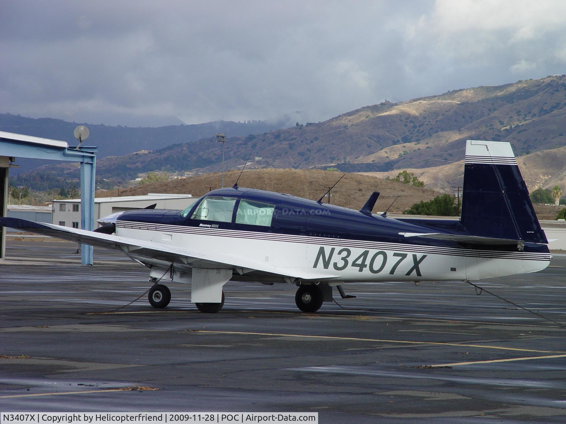 N3407X, 1966 Mooney M20E C/N 1110, Tied down and parked