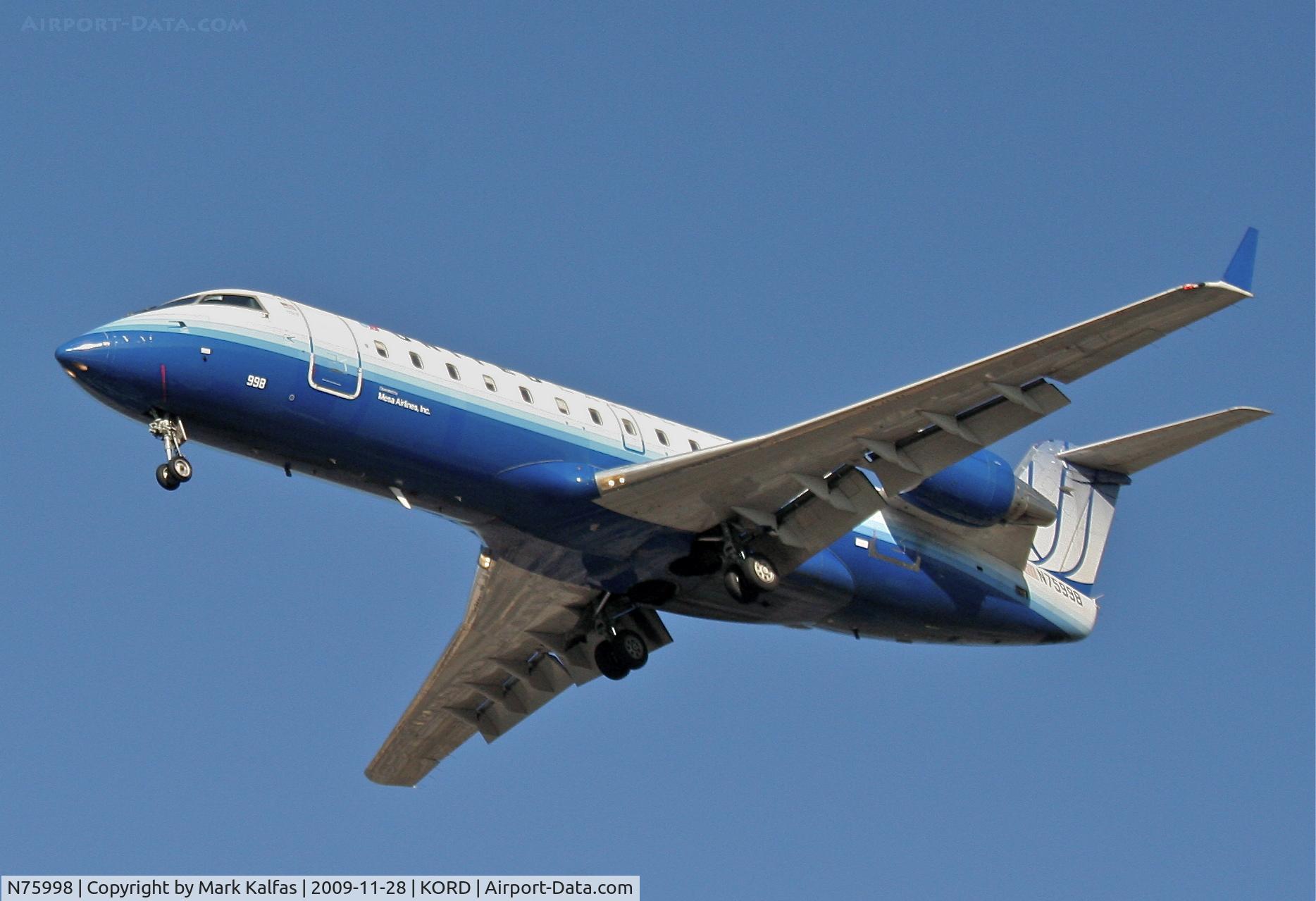 N75998, 1999 Bombardier CRJ-200ER (CL-600-2B19) C/N 7336, Mesa Airlines, CL-600-2B19, ASH7075 arriving 27L from KDTW.