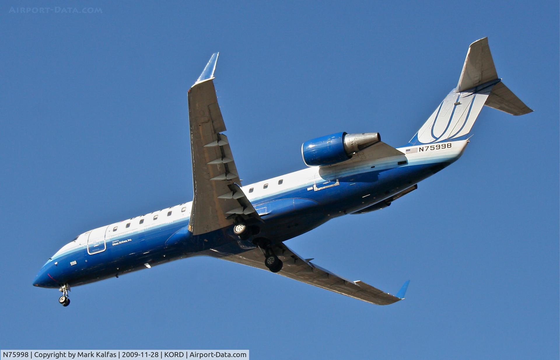 N75998, 1999 Bombardier CRJ-200ER (CL-600-2B19) C/N 7336, Mesa Airlines, CL-600-2B19, ASH7075 arriving 27L from KDTW.