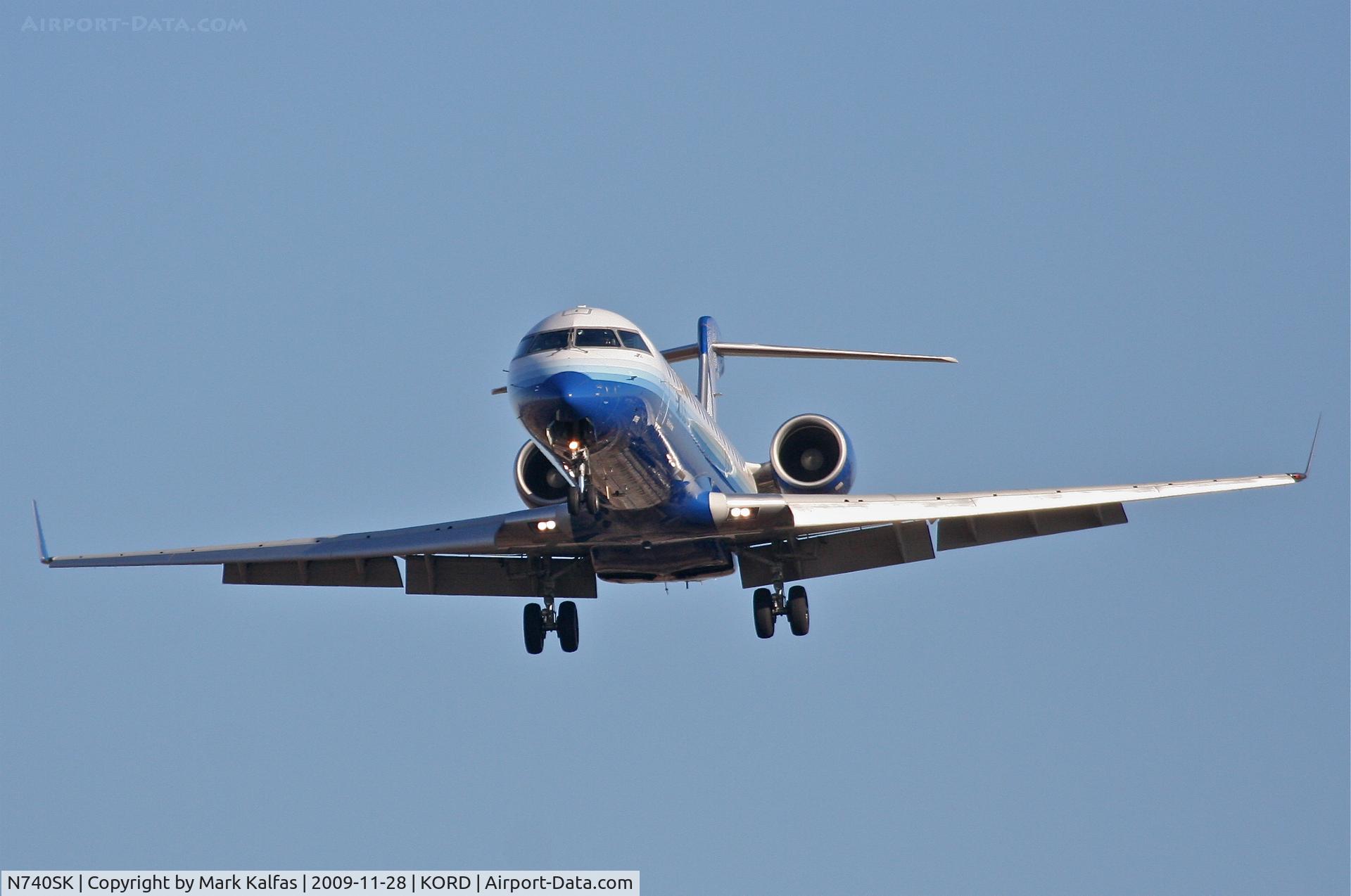 N740SK, 2005 Bombardier CRJ-701 (CL-600-2C10) Regional Jet C/N 10196, SkyWest CL-600-2C10, SKW6690 short final 27L,  from KSBN.