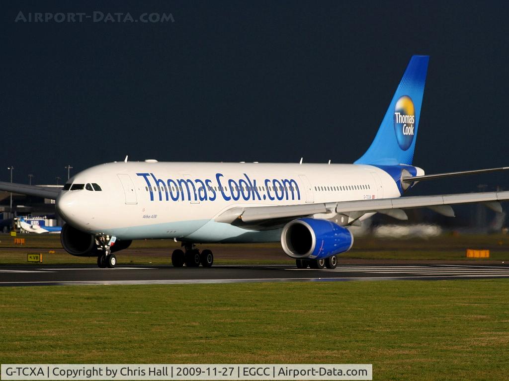 G-TCXA, 2006 Airbus A330-243 C/N 795, Thomas Cook Airlines A330 departing from RW 23L as the storm clouds roll in