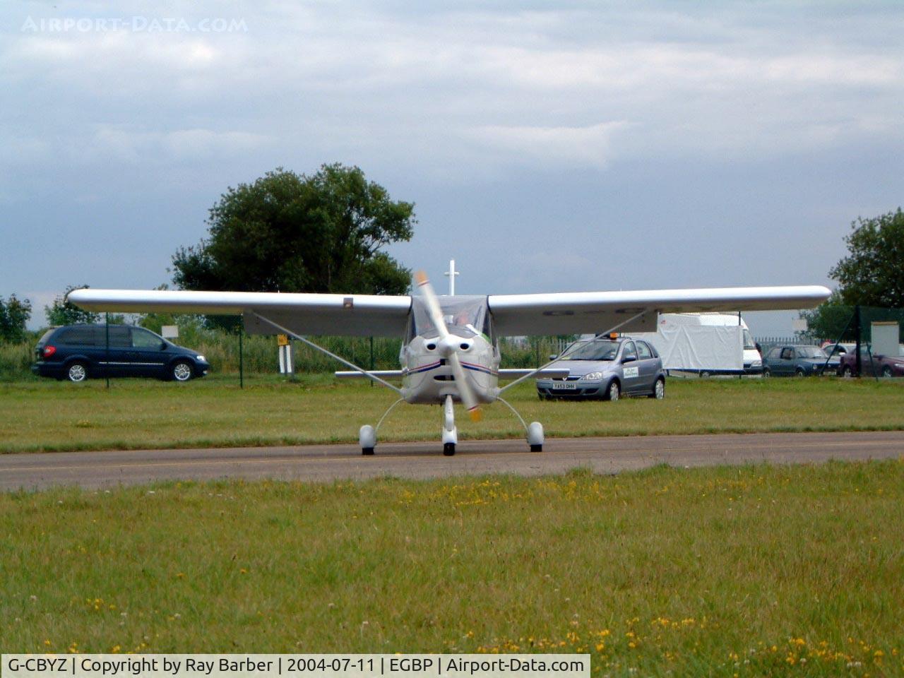 G-CBYZ, 2003 Tecnam P-92EA Echo Super C/N PFA 318A-13984, Tecnam P.92-EA Echo [PFA 318A-13984] Kemble~G 11/07/2004. Seen at the PFA Fly in 2004 Kemble UK. Reminds me of a face looking nose on with the prop spinner as the nose. 