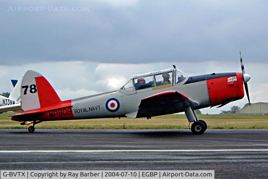 G-BVTX, 1952 De Havilland DHC-1 Chipmunk T.10 C/N C1/0705, DHC-1 Chipmunk 22A [C1/0705] Kemble~G 10/07/2004. Seen at the PFA Fly in 2004 Kemble UK. Also wears former Royal Navy marks of WP809 coded 78 and ensign on the nose